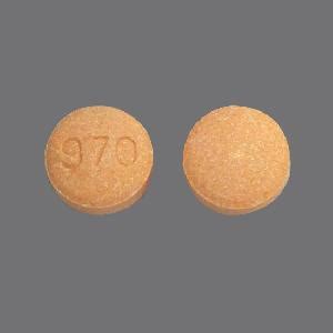 This yellow round pill with imprint TV 9702 on it has been identified as Carbidopalevodopa 25 mg 100 mg. . 970 pill orange